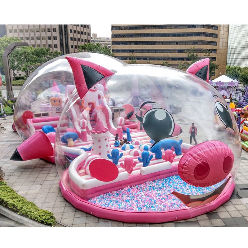 pink inflatable pig castle